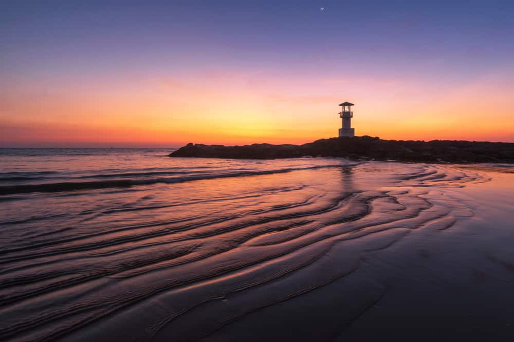 sunset as seen with a view of the lighthouse on Khao Lak in Phang Nga, Thailand